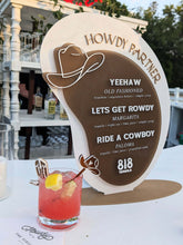 Load image into Gallery viewer, Beige and Brown drink menu with cowboy hat and fonts
